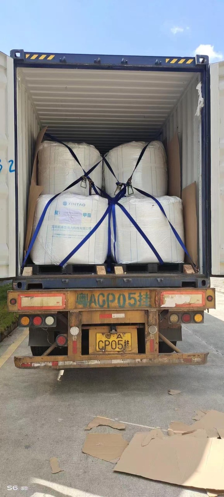 Bulk bags of PMMA resin secured inside a shipping container